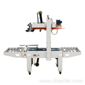 Carton sealing machine with side belt conveyor